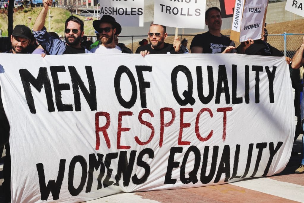 men protest in favor of gender equality