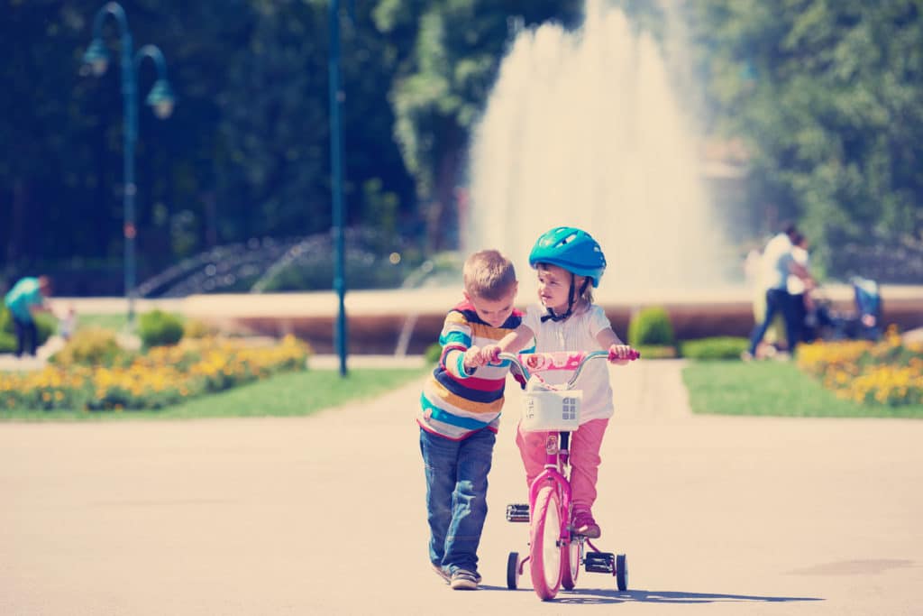 boy and girl cycling